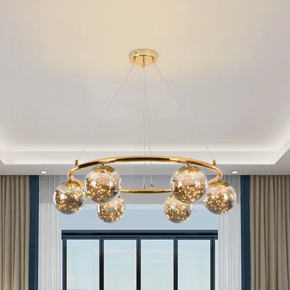 Modernist Smoke Gray Glass Ball Chandelier - 6 Head Brass Ring Pendant Light with Unique Glowworm Design Smoke Gray